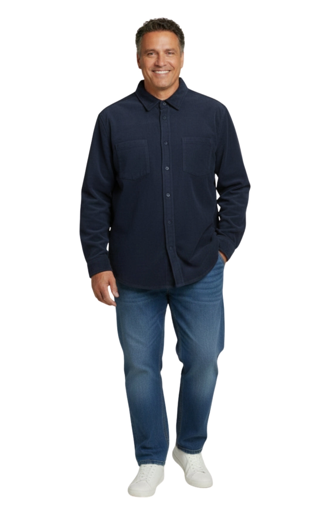 Man wearing a navy shirt and blue jeans on a white background